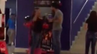 Woman catches her man at the movies with his side chick!