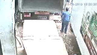 Work Accident: Man gets crushed against two trucks while assisting one reversing!