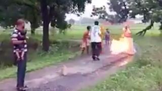 Old lady burns herself in front of her family over a land dispute!