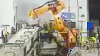 Worker gets crushed by a robotic arm!