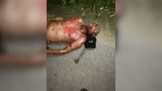 Male corpse with throat slit