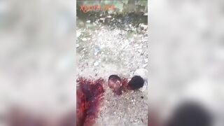 Haitian Massacre- Shows corpses of gang members brutally beheaded