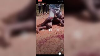 Brutally killing man with a hammer in Africa