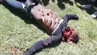 Mutilation of a man's body in Haiti