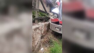 The man riding a motorbike was cut in half