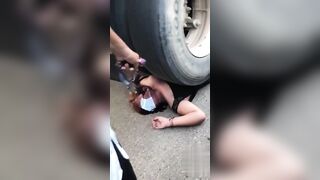 Woman crushed by truck wheel