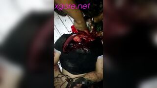 Video Beheading a man with his hands tied