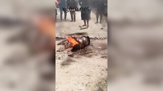 Agitated mob is burning a rapist alive