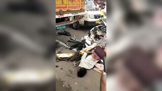 Accident video- An unlucky man is sandwiched between a car and a truck