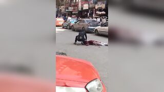 Man cuts woman's throat on the street