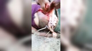 Gore video - Dissecting the stomach and gouging out the woman's intestines brutally