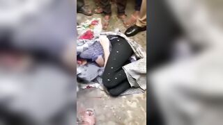 Gore video- the headless body of the girl wrapped in a blanket