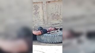 Horrible street accident video - a resident was crushed by an overturned truck