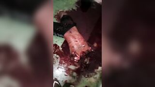 Gore video- The brazilian gang cut the body of a young man in the room