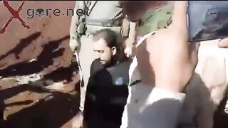 Beheading Video- The syrian spy was beheaded quickly