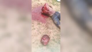 Video- beheaded, cut off a man's leg, gutted a man