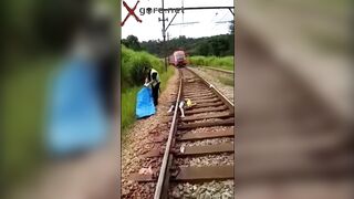 Gore video- They are collecting body pieces of the man on the train track