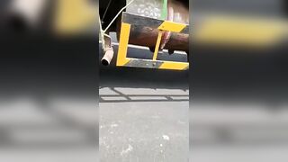 An Indian woman was pinned under the wheel of a truck