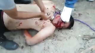 Gore video - the man was butchered by the drug gang