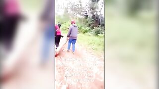 Gore video - African female soldier dragged then beheaded by terrorists