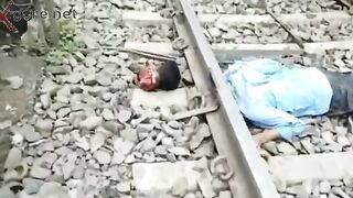 Gore video- Young man cut off his head by train