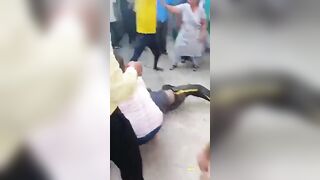 Guy whipped to death as crowd wristwatches