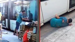 Drunk man is badly injured after getting run over by a bus - Brazil