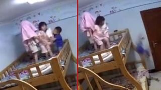 Toddler falls from top of bunk bed onto floor whilst playing - China