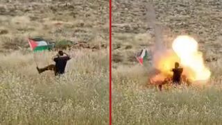 Israeli man attempts to remove a Palestinian flag, which turned out to be booby-trapped with an IED - Israel