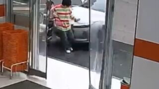 Mother and daughter are crushed against a wall by out of control car while leaving store - Nanchang, China