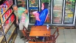 Gunman dressed as a papangu shoots customer in the back inside convenience store - Olinda, Brazil