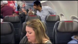 Racist Passenger gets put in a Chockehold
