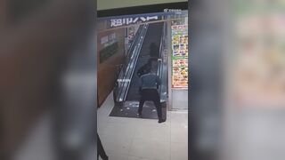 Chinese Escalator Swallows Woman