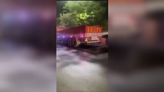 Speeding truck drags a motorcycle underneath