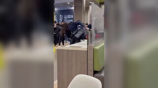 Long haired person gets into fight at a McDonalds in San Francisco