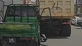 Woman on the road gets crushed by a truck - April 15, 2024