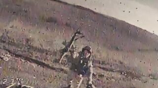 Soldier tries to knock down the FPV-Dron, throwing a machine gun