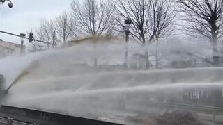 Protesting farmers spray manure at police during demonstration in Brussels