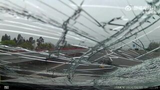 Careless Cyclist Breaks The Windshield