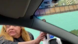 Crazy fat woman starts fighting with a man because he confronts her about driving badly