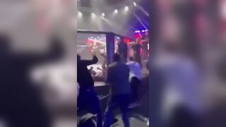 MMA Fighter Is beaten After Kicking Ring Girl's Ass