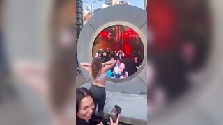 Woman Flashes Her Boobs at the NY to Dublin portal