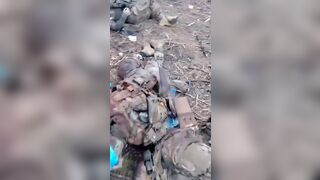 Ukrainian soldier records his dead platoon mates.