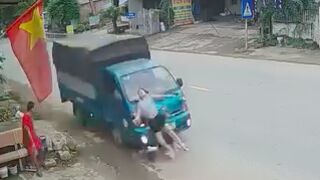 Woman gets struck from behind by a minivan while walking - Vietnam