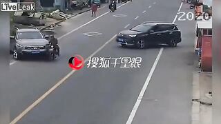 Lexus suv runs over motorcyclist