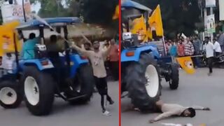 Man gets run over by a tractor during street takeover - India