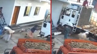 Truck driver tries to stop his truck rolling away but gets crushed against a wall and killed - Perumbavoor, India
