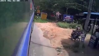 Woman Falls Out Of The Moving Bus In India