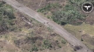 Soldier jumps off motorbike as an FPV drone approaches, only to be hit moments later