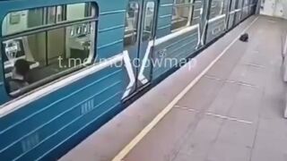 Crazy Moscow Girl Jumps On Subway Tracks, Survives !